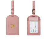 étiquette de valise dorée motif avion