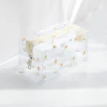trousse de toilette femme transparente marguerites