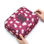 trousse de voyage à motifs floraux