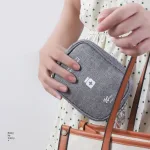 trousse de voyage essentielle gris
