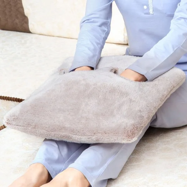 chauffe-pied électrique en peluche