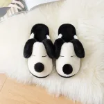 chaussons en forme d'animaux chien noir et blanc