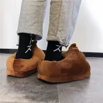 chaussons en forme d'emoji caca