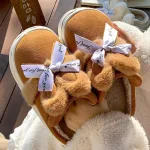 chaussons en peluche gros lapin