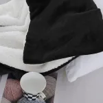 plaid en polaire avec finition fourrure Sherpa
