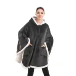 poncho polaire à poches pour un confort optimal