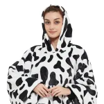 pull polaire à motif vache pour femme